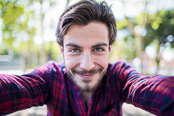 Young urban man taking a selfie