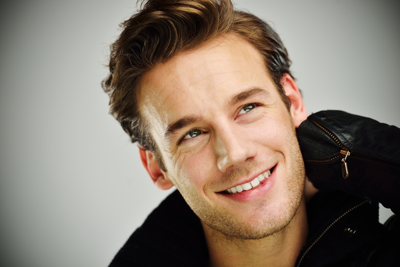 Attractive young guy posing in studio